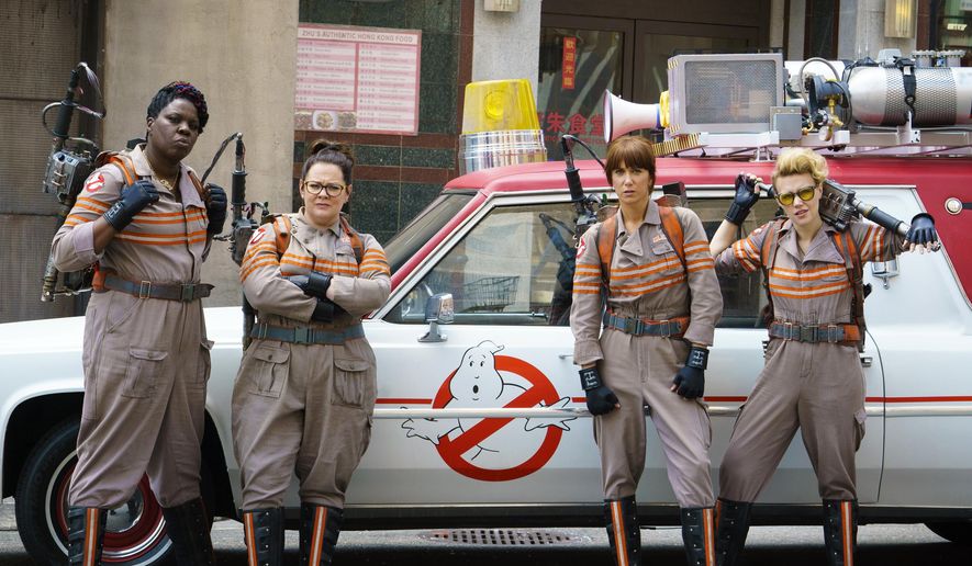 FILE - In this image released by Sony Pictures, from left, Leslie Jones, Melissa McCarthy, Kristen Wiig and Kate McKinnon from the film, "Ghostbusters," opening nationwide on July 15. (Hopper Stone/Columbia Pictures, Sony via AP)