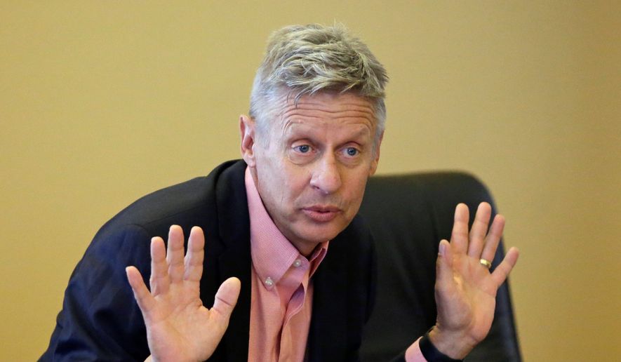 Libertarian presidential candidate and former New Mexico Gov. Gary Johnson speaks with legislators at the Utah State Capitol in Salt Lake City in this May 18, 2016, file photo. (AP Photo/Rick Bowmer, File)