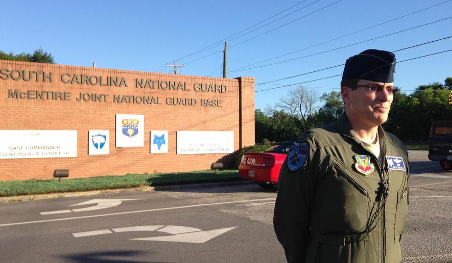 Base commander Col. Nicholas Gentile speaks with reporters outside McEntire Joint National Guard Base in Eastover, SC., Wednesday June 8, 2016. Two F-16C South Carolina Air National Guard jets collided over eastern Georgia, Tuesday evening. Gentile says the planes were totally destroyed, but the pilots ejected and survived, and have returned to South Carolina. (AP Photo/Susanne M. Schafer)