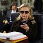 Hillary Clinton&#39;s BlackBerry use was well-known, but State Department staffers in charge of handling open records requests weren&#39;t aware of her secret email account, according to the designated expert. (Associated Press)