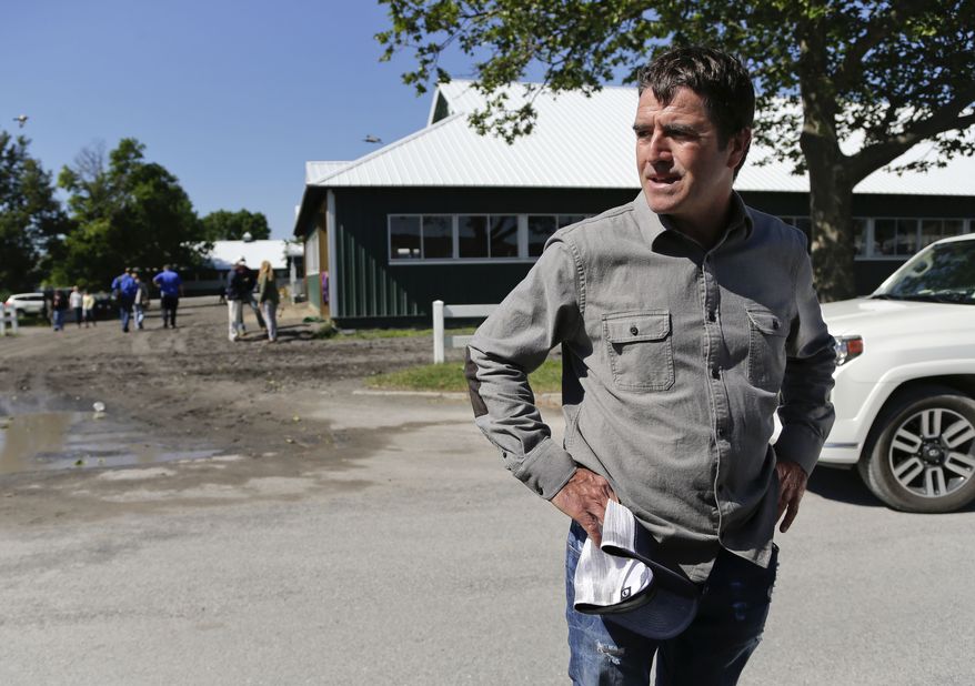 Keith Desormeaux, trainer for Belmont Stakes hopeful and Preakness Stakes winner Exaggerator, pauses while answering questions for the media at Belmont Park, Thursday, June 9, 2016, in Elmont, N.Y. Exaggerator will compete in the 148th running of the Belmont Stakes horse race on Saturday. (AP Photo/Julie Jacobson)