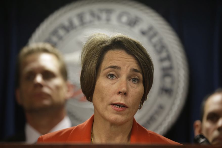 Massachusetts Attorney General Maura Healey responds to questions from reporters during a news conference at the federal courthouse, Thursday, June 9, 2016, in Boston. Law enforcement officials say more than 60 alleged gang members from Boston and other cities in eastern Massachusetts have been charged with drug, weapons and racketeering charges. (AP Photo/Steven Senne)