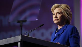 Democratic presidential candidate Hillary Clinton pauses while speaking during a Planned Parenthood Action Fund membership event in Washington on June 10, 2016. (Associated Press) **FILE**