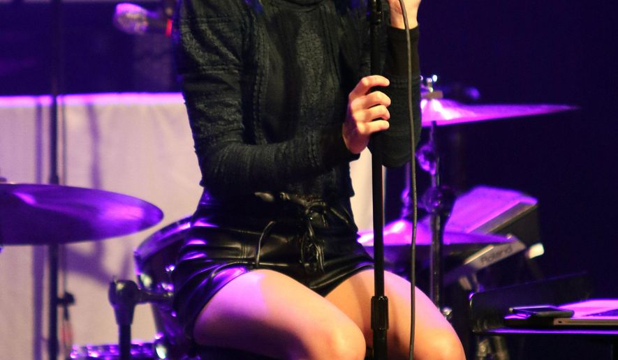 FILE - In this March 2, 2016 file photo, Christina Grimmie performs as the opener for Rachel Platten at Center Stage Theater, in Atlanta. Florida authorities say "The Voice" star Grimmie is in critical condition after being shot at a concert venue in Orlando by a suspect who then fatally shot himself after being tackled by the singer-songwriter’s brother. Orlando Police Department officials tell WKMG-TV that Grimmie was shot Friday night, June 10, 2016, at The Plaza Live, where she was scheduled to perform. (Photo by Katie Darby/Invision/AP, File)