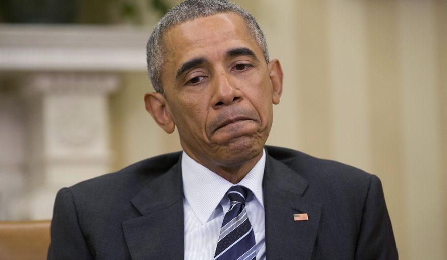 President Barack Obama pauses while speaking to members of the media in the Oval Office of the White House in Washington, Monday, June 13, 2016. Obama said there's no clear evidence that the shooter at an Orlando nightclub was directed to conduct his attack or part of a larger plot. (AP Photo/Pablo Martinez Monsivais)
