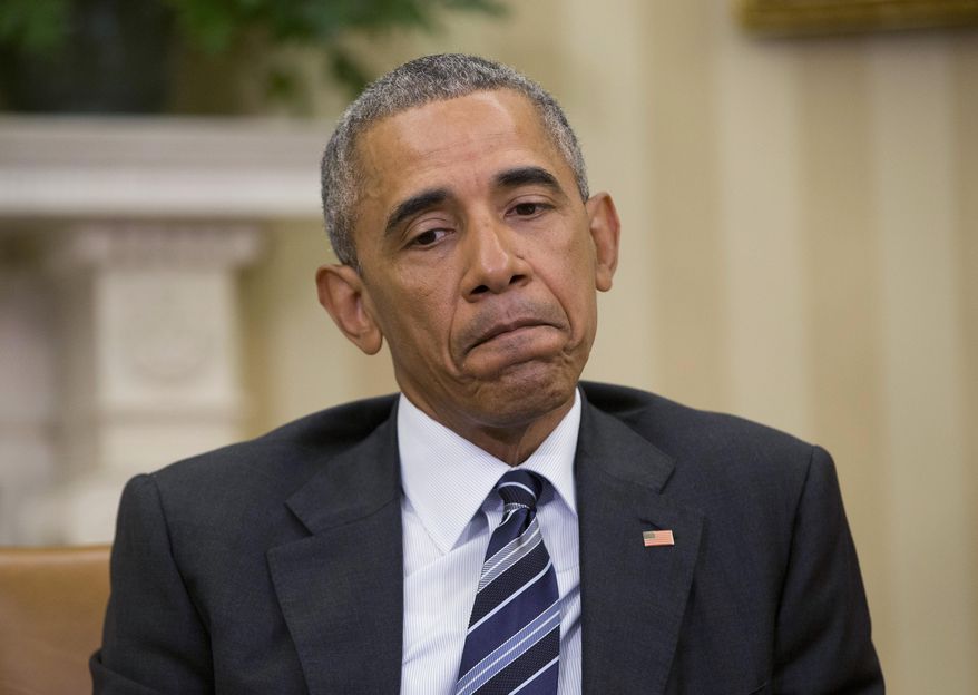 President Barack Obama pauses while speaking to members of the media in the Oval Office of the White House in Washington, Monday, June 13, 2016. Obama said there's no clear evidence that the shooter at an Orlando nightclub was directed to conduct his attack or part of a larger plot. (AP Photo/Pablo Martinez Monsivais)