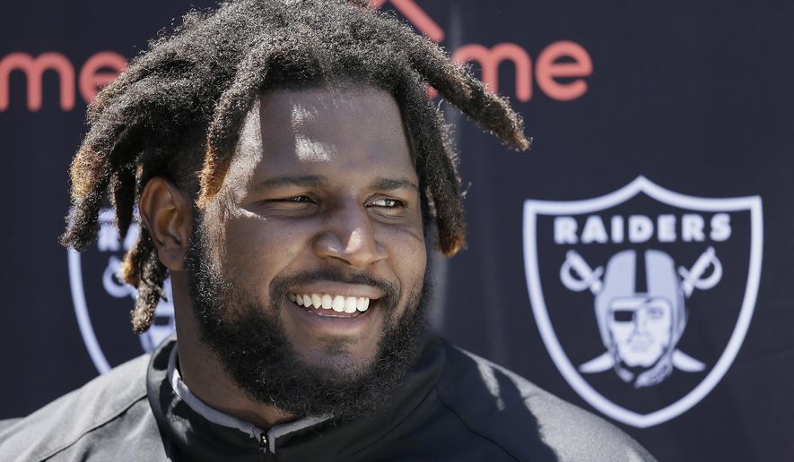 Oakland Raiders defensive end Mario Edwards answers questions following workouts at the team&#x27;s football minicamp Tuesday, June 14, 2016, in Alameda, Calif. (AP Photo/Eric Risberg)