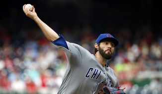 Chicago Cubs starting pitcher Jason Hammel throws during the fourth inning of a baseball game against the Washington Nationals at Nationals Park, Wednesday, June 15, 2016, in Washington. (AP Photo/Alex Brandon)