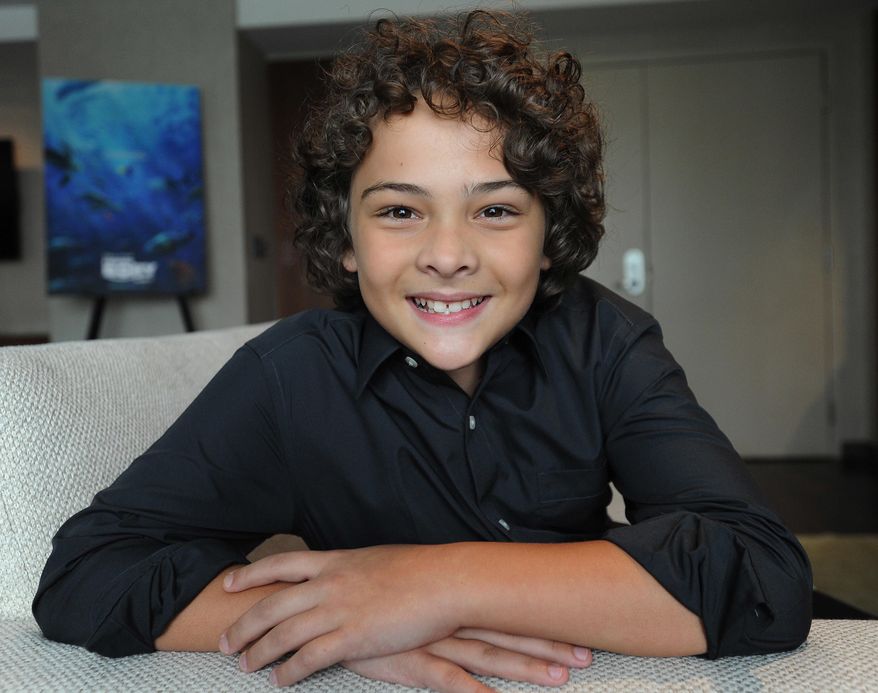 In this June 14, 2016 photo, Hayden Rolence, 12, poses for a photo in Chicago. Hayden, a student at Still Middle School in Aurora, Ill., supplies the voice and personality of little clownfish Nemo in the new Disney/Pixar animated adventure "Finding Dory." (Mark Welsh/Daily Herald, via AP) MANDATORY CREDIT, MAGS OUT/Daily Herald via AP) MANDATORY CREDIT; MAGS OUT; TV OUT