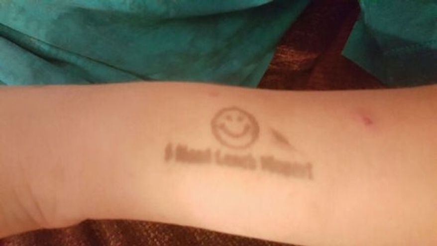 Jon Bivens of Gardendale, Alabama, is accusing an elementary school of bullying and "branding" his 8-year-old son after lunch workers stamped the boy's arm because his account was running low. (AL.com/Courtesy of Jon Bivens)