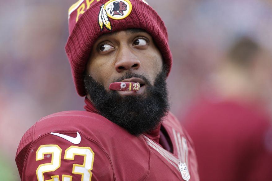 Washington Redskins cornerback DeAngelo Hall (23) looks over his shoulder as he crews on his mouth guard during the second half of an NFL football game against the Buffalo Bills in Landover, Md., Sunday, Dec. 20, 2015. (AP Photo/Mark Tenally) ** FILE **
