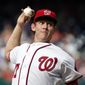 Washington Nationals starting pitcher Stephen Strasburg throws during the fourth inning of a baseball game against the Chicago Cubs at Nationals Park, Wednesday, June 15, 2016, in Washington. (AP Photo/Alex Brandon) **FILE**