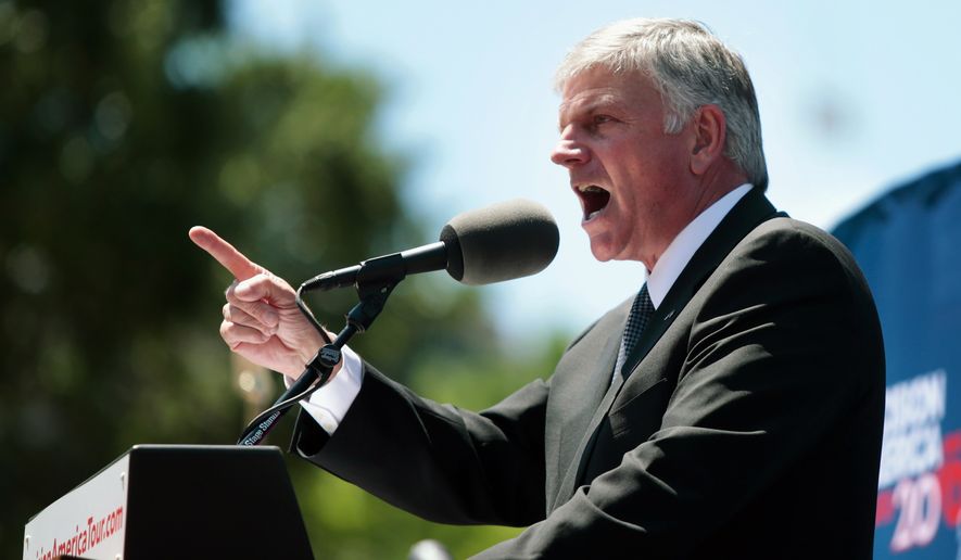 The Rev. Franklin Graham speaks during his rally at the State Capitol in Madison, Wis., Wednesday, June 15, 2016. (Michael P. King/Wisconsin State Journal via AP)  ** FILE **