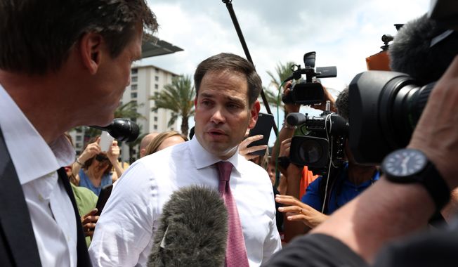 Florida Sen. Marco Rubio answers questions from the press after paying his respects to the victims of the Pulse nightclub shooting at Dr. Phillips Center for the Performing Arts in Orlando, Fla., on Thursday, June 16, 2016. (Joshua Lim/Orlando Sentinel via AP) ** FILE **