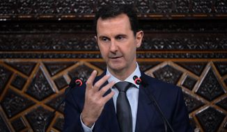 In this photo released by the Syrian official news agency SANA, Syrian President Bashar Assad speaks in Damascus, Syria, Tuesday, June 7, 2016. State Department officials shook up America’s generally obedient diplomatic establishment this week with an internal memo urging U.S. military action against Syria’s government with the goal of pressing Assad to accept a cease-fire and gaining the upper hand on him in future talks on a political transition. (SANA via AP)