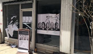 A ripped up poster advertising the streaming event of Radiohead&#39;s new album, at a record shop, in Istanbul, Saturday, June 18, 2016. Turkish media report a mob of 20 assailants carrying sticks and bottles attacked Radiohead fans who had gathered at a record store in Istanbul to listen to the band&#39;s new album. The private Dogan news agency reported Saturday that one person was wounded in the incident Friday at the Velvet Indieground record shop. (AP Photo/Dominique Soguel)