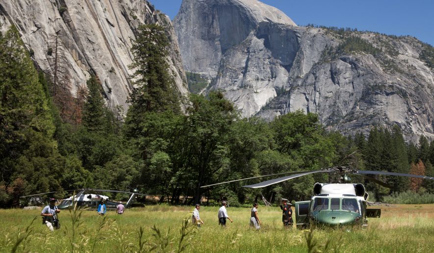 The Obamas toured Yosemite, the country&#39;s oldest national park, to mark the 100th anniversary of the park system. President Obama, who said rising temperatures are damaging national parks, has proposed a 9 percent increase to boost the National Park Service&#39;s annual funding to $3.1 billion. (Associated Press)