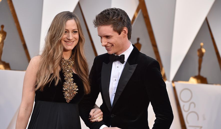 FILE - In a Sunday, Feb. 28, 2016 file photo, Hannah Bagshawe, left, and Eddie Redmayne arrive at the Oscars, at the Dolby Theatre in Los Angeles. Redmayne and his wife Hannah Redmayne are officially new parents to a daughter Iris Mary Redmayne, the actor’s rep confirmed Sunday, June 19, 2016. (Photo by Jordan Strauss/Invision/AP, File)