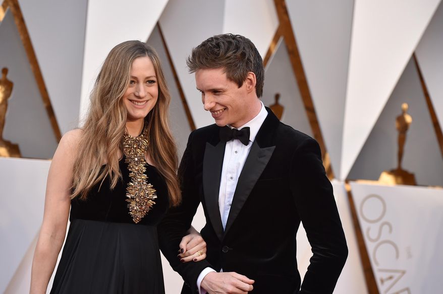 FILE - In a Sunday, Feb. 28, 2016 file photo, Hannah Bagshawe, left, and Eddie Redmayne arrive at the Oscars, at the Dolby Theatre in Los Angeles. Redmayne and his wife Hannah Redmayne are officially new parents to a daughter Iris Mary Redmayne, the actor’s rep confirmed Sunday, June 19, 2016. (Photo by Jordan Strauss/Invision/AP, File)
