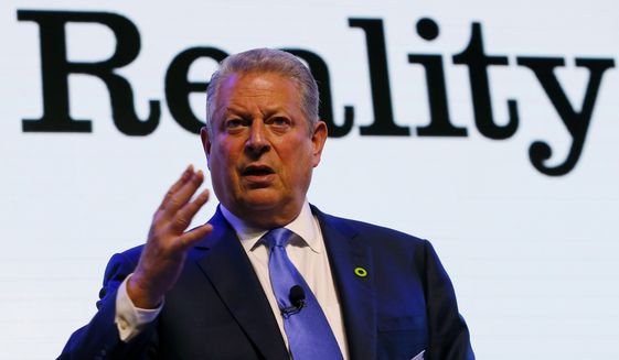 Former U.S. Vice President Al Gore addresses participants during a three-day climate change training and workshop in suburban Pasay city, south of Manila, on how best to address the effects of global climate change on March 14, 2016. Gore, who won the Nobel Peace Prize in 2007, has chosen the Philippines as the venue for his Climate Reality Project workshop which hopes to offer solutions to the global concerns on climate change. (Associated Press) **FILE**