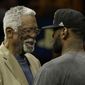 Hall of Famer Bill Russell, left, greets Cleveland Cavaliers forward LeBron James after Game 7 of basketball&#39;s NBA Finals between the Golden State Warriors and the Cavaliers in Oakland, Calif., Sunday, June 19, 2016. The Cavaliers won 93-89. (AP Photo/Marcio Jose Sanchez)