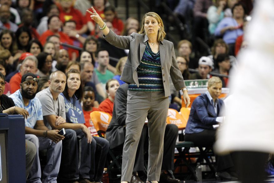 FILE - In this Oct. 9, 2015 file photo, Minnesota Lynx head coach Cheryl Reeve directs her team in the first half of Game 3 of the WNBA Finals basketball series against the Indiana Fever in Indianapolis. When the Lynx visit the Los Angeles Sparks on Tuesday, June 21, it will be just another regular-season game for two teams with championship aspirations. The defending champion Lynx have won their opening 12 games and the Sparks are 11-0, marking the first time that two unbeaten teams from the WNBA, NBA, NFL, MLB, or NHL have met with each team having at least 10 wins with no losses and no ties. (AP Photo/AJ Mast)