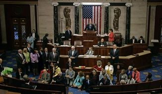In this frame grab taken from AP video Georgia Rep. John Lewis, center, leads a sit-in of more than 200 Democrats in demanding a vote on measures to expand background checks and block gun purchases by some suspected terrorists in the aftermath of last week&#x27;s massacre in Orlando, Florida, that killed 49 people in a gay nightclub.  Rebellious Democrats shut down the House&#x27;s legislative work on Wednesday, June 22, 2016, staging a sit-in on the House floor and refusing to leave until they secured a vote on gun control measures before lawmakers&#x27; weeklong break.  (AP Photo)