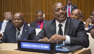 Joseph Kabila (right), President of the Democratic Republic of the Congo, during the fourth meeting of the regional oversight mechanism of the Peace, Security and Cooperation Framework for the Democratic Republic of the Congo and the Region on Sept. 22, 2014 at the United Nations in New York City. (UN Photo/Amanda Voisard)