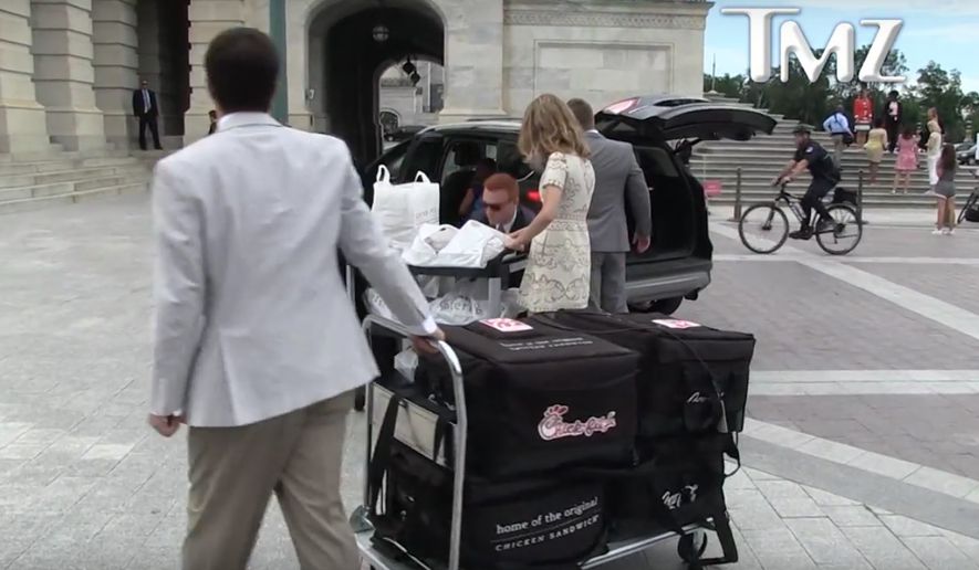 According to footage caught by TMZ, Democrats accepted a massive shipment of Chick-fil-A just outside the Capitol. &quot;Is this all for us?&quot; said one woman, apparently a staffer, as she pushed one of two loaded carts onto the pavement. (TMZ)