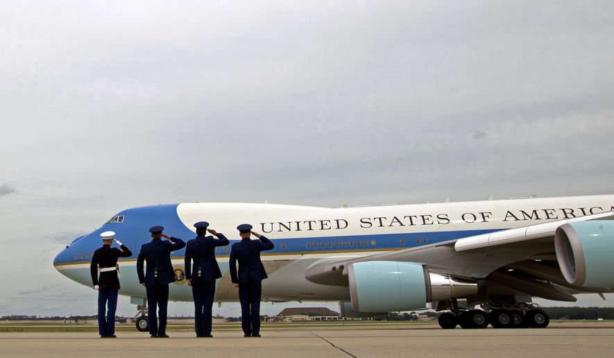 Military personnel salutes as Air Force One, with President Barack Obama aboard, departs, Thursday, June 23, 2016, from Andrews Air Force Base, Md. Obama is traveling to the San Francisco-Bay Area today and attending a Global Entrepreneur Summit at Stanford University tomorrow. . (AP Photo/Jose Luis Magana)