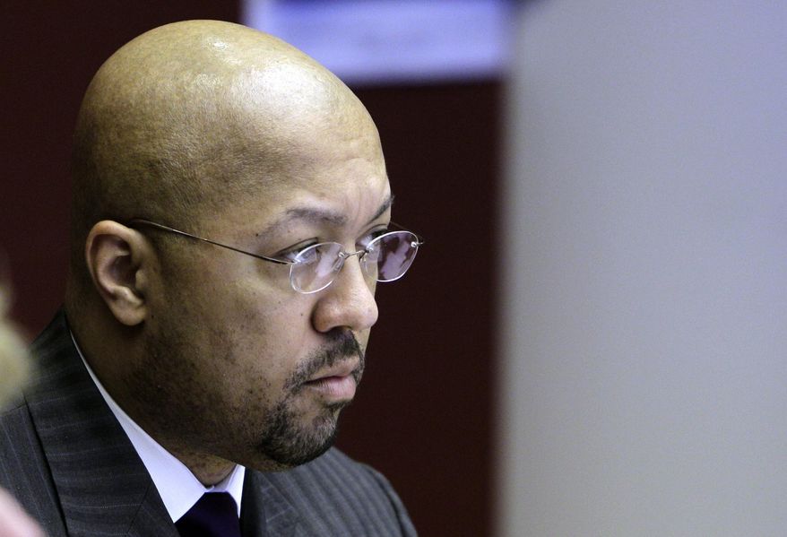 FILE- In an April 12, 2011 file photo, then Detroit City Council President Charles Pugh is seen during a council meeting in Detroit. The former councilman, who quit in 2013, has been charged with criminal sexual conduct in a case involving a 14-year-old boy a decade earlier. The Wayne County prosecutor's office says 44-year-old Charles Pugh was arrested Thursday, June 23, 2016, at his home in New York City, a day after being charged. He's awaiting extradition. If convicted, he faces up to life in prison. (AP Photo/Carlos Osorio, File)
