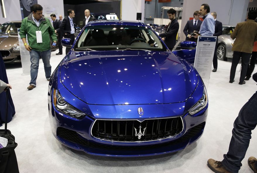 FILE - In this Feb. 6, 2014, file photo, a Maserati Ghibli S Q4 is displayed during the media preview of the Chicago Auto Show at McCormick Place in Chicago. Fiat Chrysler is adding 13,000 Maseratis to a recall of vehicles with confusing gear shifters like one in the SUV that crushed and killed Star Trek actor Anton Yelchin. The company said Thursday, June 23, 2016, it's adding 2014 and 2015 Quattroporte and Ghibli sedans to the recall under pressure from the National Highway Traffic Safety Administration. (AP photo/Nam Y. Huh, File)
