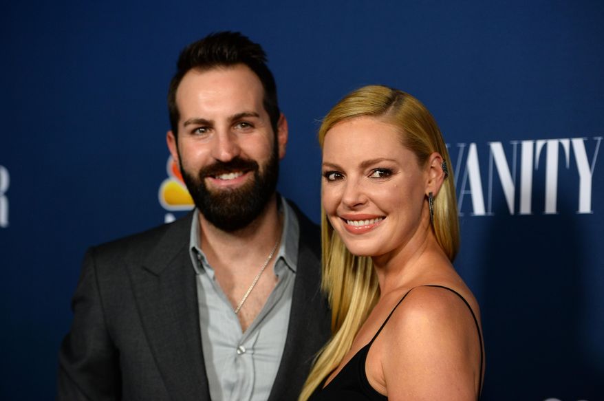 FILE - In this September 16, 2014, file photo, Josh Kelley, left, and Katherine Heigl arrive at NBC and Vanity Fair's 2014 - 2015 TV Season Event in Los Angeles. The couple announced via People magazine on June 23, 2016, that Heigl is pregnant with a baby boy due in January. (Photo by Jordan Strauss/Invision/AP, File)