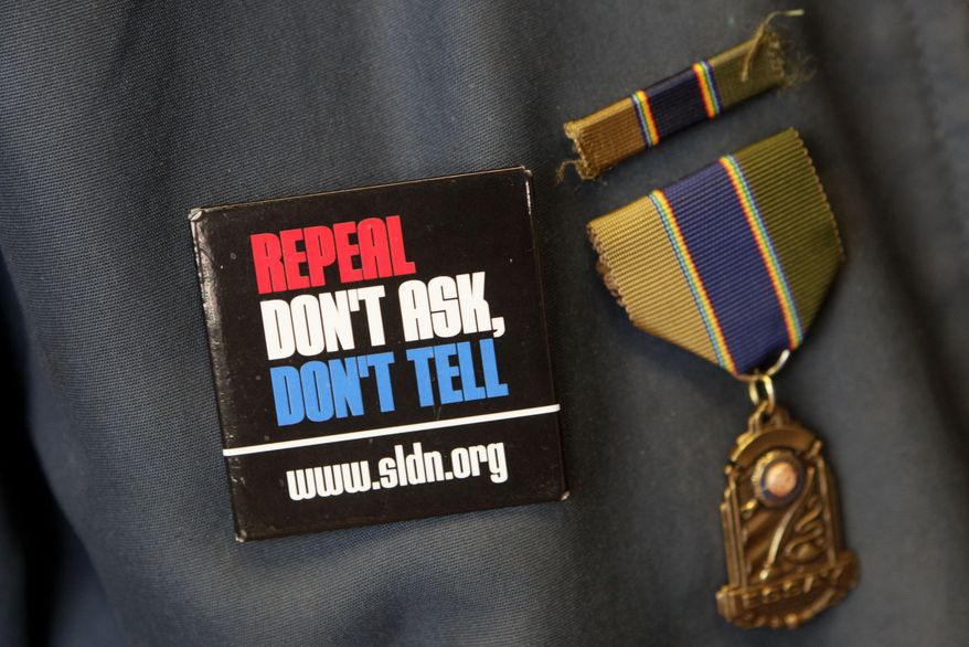 A button on the jacket of World War II veteran Paul Goercke, chaplain at the Alexander Hamilton American Legion Post 448, is shown at their office in San Francisco, Tuesday, Sept. 21, 2010. According to its website, the Alexander Hamilton Post 448 is the only post whose membership is predominantly Gay, Lesbian, Bisexual and Transgendered. (AP Photo/Jeff Chiu)