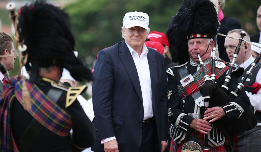 The presumptive Republican presidential nominee  Donald Trump  poses with a bagpiper as he arrives at his revamped Trump Turnberry golf course in Turnberry Scotland Friday June 24, 2016. Trump saluting the United Kingdom&#x27;s vote to leave the European Union, saying &quot;they took back their country, it&#x27;s a great thing.&quot; Trump arrived at his Turnberry golf course in Scotland a day after the so-called Brexit vote. (Andrew Milligan/PA via AP) UNITED KINGDOM OUT  NO SALES NO ARCHIVE