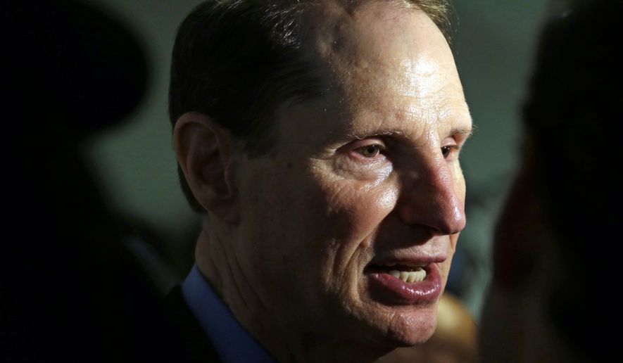 FILE - In this Friday, Sept. 25, 2015, file photo, U.S. Sen. Ron Wyden, D-Ore., speaks after a news conference in Portland, Ore. Wyden is pushing for more answers on why doctors and patient advocates with financial ties to the pharmaceutical industry came to serve on a panel that advises the federal government on pain issues. (AP Photo/Don Ryan, File)