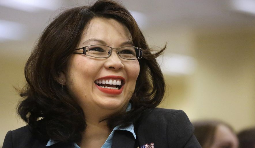FILE - In this Aug. 13, 2014, file photo, U.S. Rep. Tammy Duckworth, D-Ill., appears in Springfield, Ill. A settlement in the workplace retaliation lawsuit against Duckworth concluded Friday, June, 24, 2016 with an agreement that no law was violated, removing an obstacle in bid to unseat Republican U.S. Sen. Mark Kirk in one of November&#x27;s most competitive Senate races. (AP Photo/Seth Perlman, File)