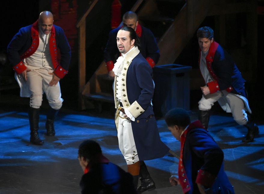 FILE - In this June 12, 2016 file photo, Lin-Manuel Miranda and the cast of "Hamilton" perform at the Tony Awards in New York. Hillary Clinton supporters will get a chance to see the hit musical "Hamilton" if they're willing to pay prices that are breathtaking even by Broadway standards. Tickets for a special matinee July 12 to benefit her campaign start at $2,700 each, while $10,000 will get a "premium seat" that includes a photo session with Clinton. The campaign website says that for $100,000 people can get a deal that includes two premium seats, a "wrap party" with Clinton "and other special guests" plus other benefits. (Photo by Evan Agostini/Invision/AP, File)