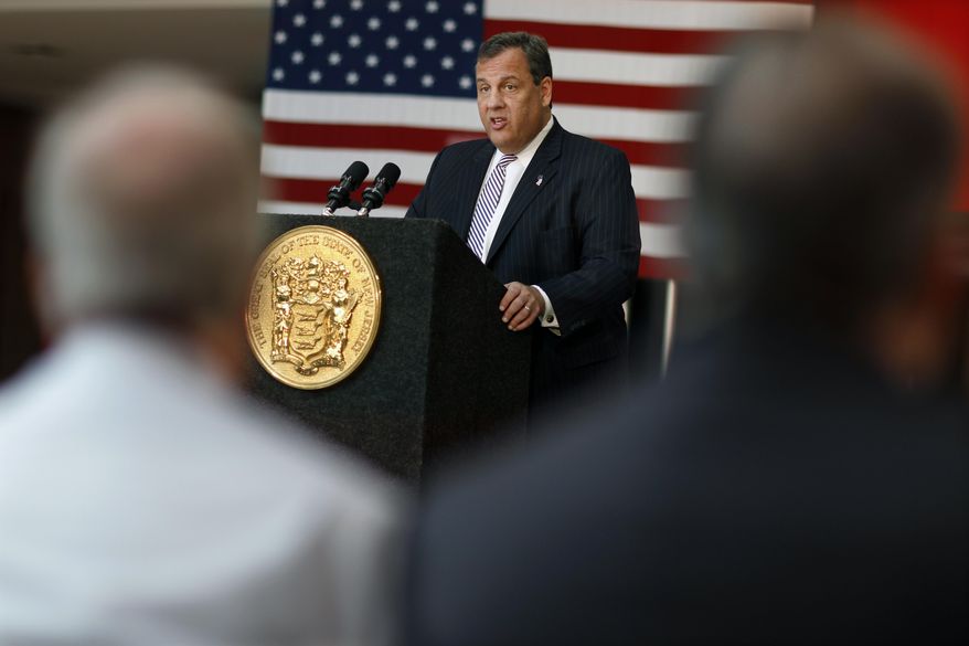 In this Tuesday, June 21, 2016 photograph, New Jersey Gov. Chris Christie addresses a gathering at Hillsborough High School as he proposes redistributing billions of dollars in educational aid from the poorest districts to hundreds of other schools, in Hillsborough Township, N.J. New Jersey's current fiscal year budget ends in about a week, and Republican Gov. Chris Christie is proposing to fill an unexpected $600 million gap in revenue by underspending on programs, including medical assistance to poor familes. (AP Photo/Mel Evans)