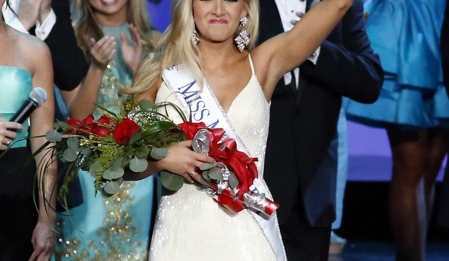 Miss Mississippi 2016 Laura Lee Lewis waves to the audience after being crowned winner during the televised scholarship pageant in Vicksburg, Miss., Saturday, June 25, 2016. (AP Photo/Rogelio V. Solis)