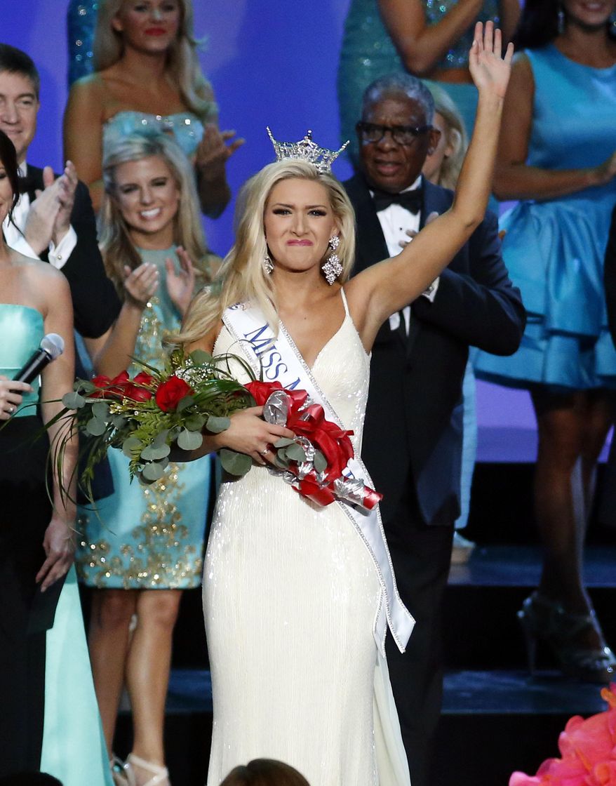 Miss Mississippi 2016 Laura Lee Lewis waves to the audience after being crowned winner during the televised scholarship pageant in Vicksburg, Miss., Saturday, June 25, 2016. (AP Photo/Rogelio V. Solis)