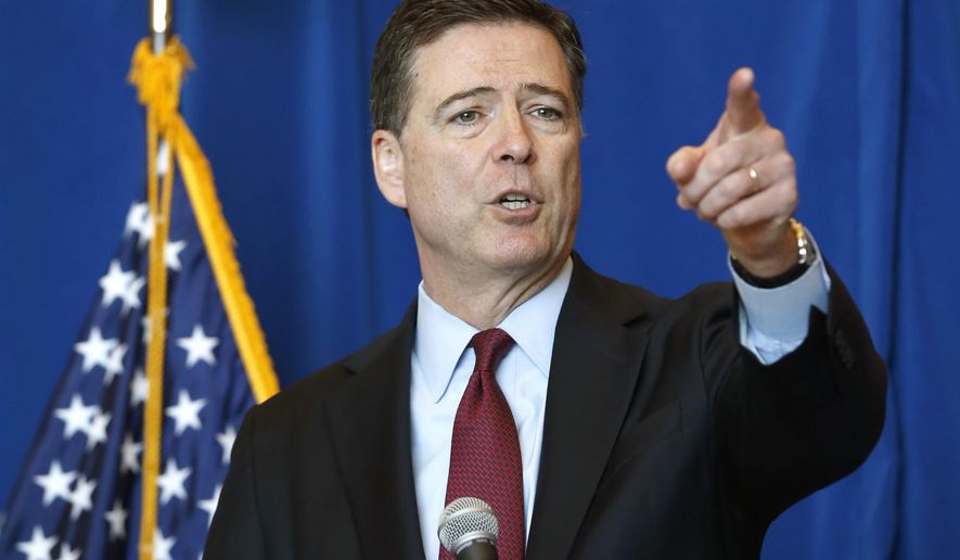 FILE - In this May 19, 2016 file photo, FBI Director James Comey, calls on a reporter during a news conference in Chicago. When Comey discussed on national television the massacre at an Orlando nightclub, he made an off-the-cuff policy decision not to speak the gunman’s name. The name Comey was refusing to say had already been known for nearly 24 hours: Omar Mateen. Forty-nine people were killed in the attack, the worst mass shooting in modern U.S. history. (AP Photo/Charles Rex Arbogast, File)