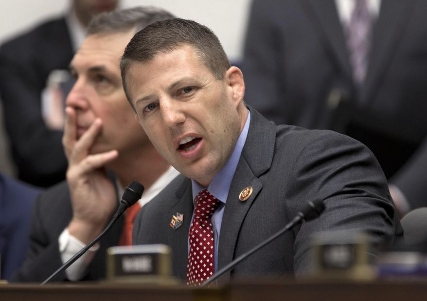 FILE - In this May 16, 2013 file photo, House Transportation and Infrastructure Full Committee member Rep. Markwayne Mullin, R-Okla. speaks on Capitol Hill in Washington. All five Oklahoma Republican U.S. House members face a primary opponent on Tuesday, June 28, 2016 but ousting one or more of them is easier said than done, even in a year when there is a strong anti-Washington mood among voters. (AP Photo/Carolyn Kaster, File)