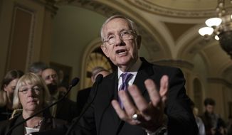Senate Minority Leader Harry Reid of Nevada and Sen. Patty Murray (left), Washington Democrat, face reporters on Capitol Hill in Washington on June 28, 2016, as the Senate split along party lines and left a $1.1 billion proposal to fight the Zika virus in limbo. (Associated Press) **FILE**