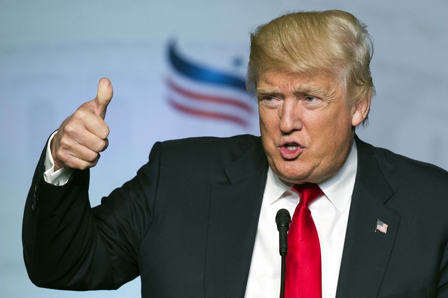 Republican presidential candidate Donald Trump gives a thumbs-up while addressing the Faith and Freedom Coalition's Road to Majority Conference in Washington on June 10, 2016. (Associated Press) **FILE**