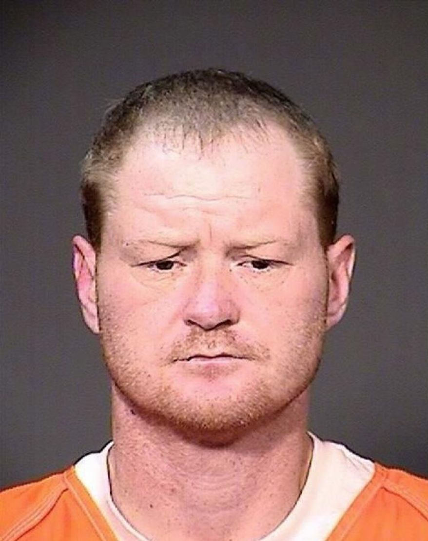 This undated photo provided by the Itasca County Sheriff's Office in Grand Rapids, Minn., shows Joseph Thoresen. Thoresen is accused of decapitating another man after his girlfriend told him that the man had sexually assaulted her. (Itasca County Sheriff's Office via AP)