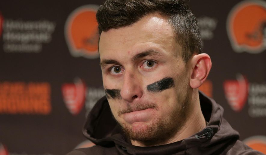FILE - In this Dec. 20, 2015, file photo, Cleveland Browns quarterback Johnny Manziel speaks with media members following the team&#x27;s 30-13 loss to the Seattle Seahawks in an NFL football game, in Seattle. Manziel has been suspended for the first four games of next season for violating the NFL&#x27;s substance-abuse policy.The suspension announced Thursday, June 30, 2016, is not related to the NFL&#x27;s domestic violence policy, but the free agent quarterback would be subject to it if he signs with another team. (AP Photo/Scott Eklund, File)