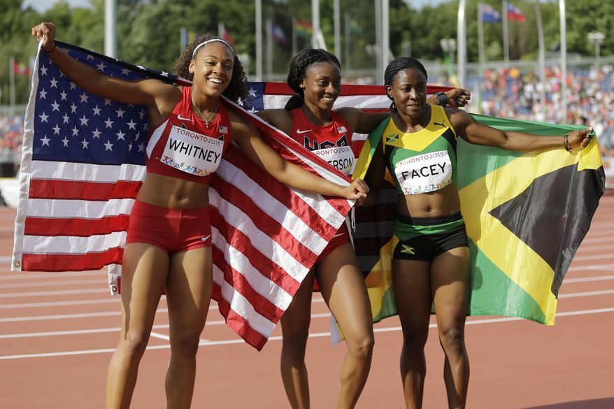 FILE - In this July 24, 2015 file photo, USA's Kaylin Whitney, from left, winning the gold medal, USA's Kyra Jefferson and Jamaica's Simone Facey celebrate after winning the finals of the women's 200 meter run at the Pan Am Games in Toronto. Jefferson won the silver and Facey the bronze. Possible new slogan for the U.S. Olympic track and field team: Higher, Faster, Younger. (AP Photo/Mark Humphrey, File)