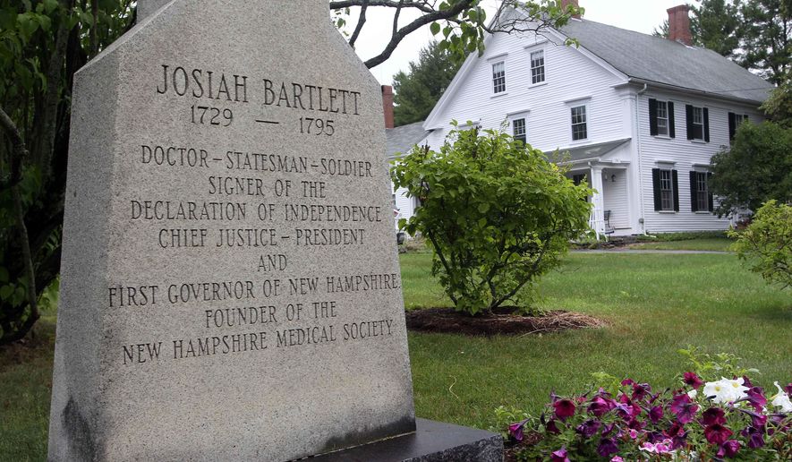 FILE In this Wednesday July 16, 2014 file photo an historic marker is seen in front of the home once owned by Josiah Bartlett, in Kingston, N.H. The home of New Hampshire Declaration of Independence signer, Bartlett, is up for sale after being in the family for seven generations. (AP Photo/Jim Cole, file)