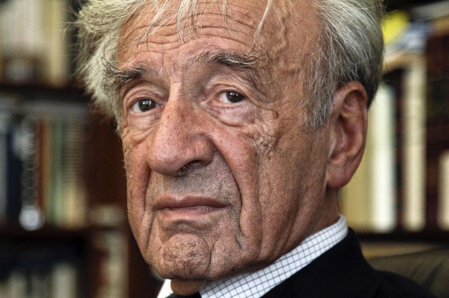 FILE - In this Sept. 12, 2012, photo Elie Wiesel is photographed in his office in New York. Israel's Yad Vashem Holocaust Memorial says Elie Wiesel has died at 87. (AP Photo/Bebeto Matthews)